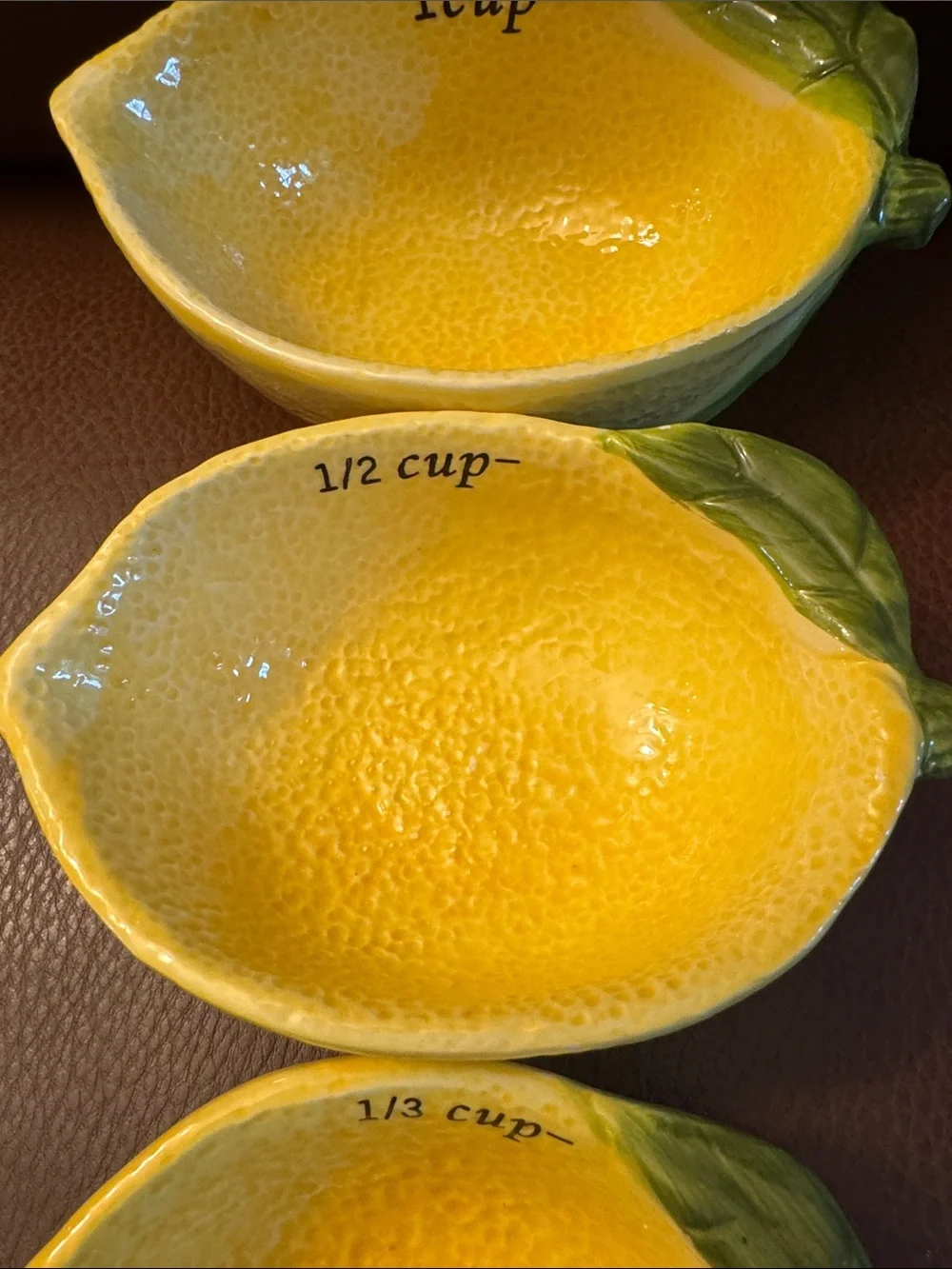 Lemon shaped nesting measuring cups